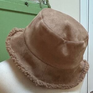 Faux suede and sherpa hat. NWOT